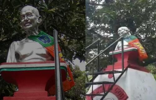 പാലക്കാട് നഗരസഭയിലെ ഗാന്ധി പ്രതിമയിൽ ബിജെപി കൊടി; പ്രതിഷേധം