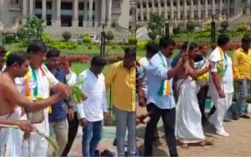 വിധാൻ സഭയ്ക്ക് മുന്നില് ഗോമൂത്രം തളിച്ച് കോൺഗ്രസ് പ്രവർത്തകർ വിധാൻ സഭയ്ക്ക് മുന്നില് ഗോമൂത്രം തളിച്ച് കോൺഗ്രസ് പ്രവർത്തകർ